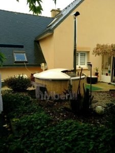 Fiberglass hot tub of spruce wood