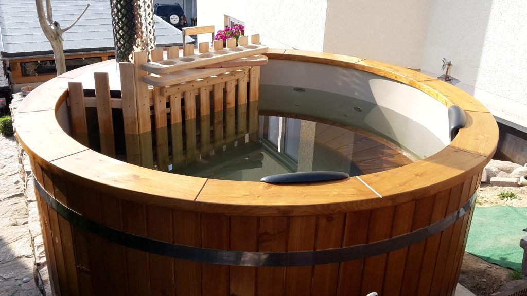 Wooden hot tub with wooden benches